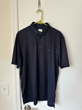 Greg Norman Collection Dark Navy Short-Sleeve Polo with Subtle Pattern